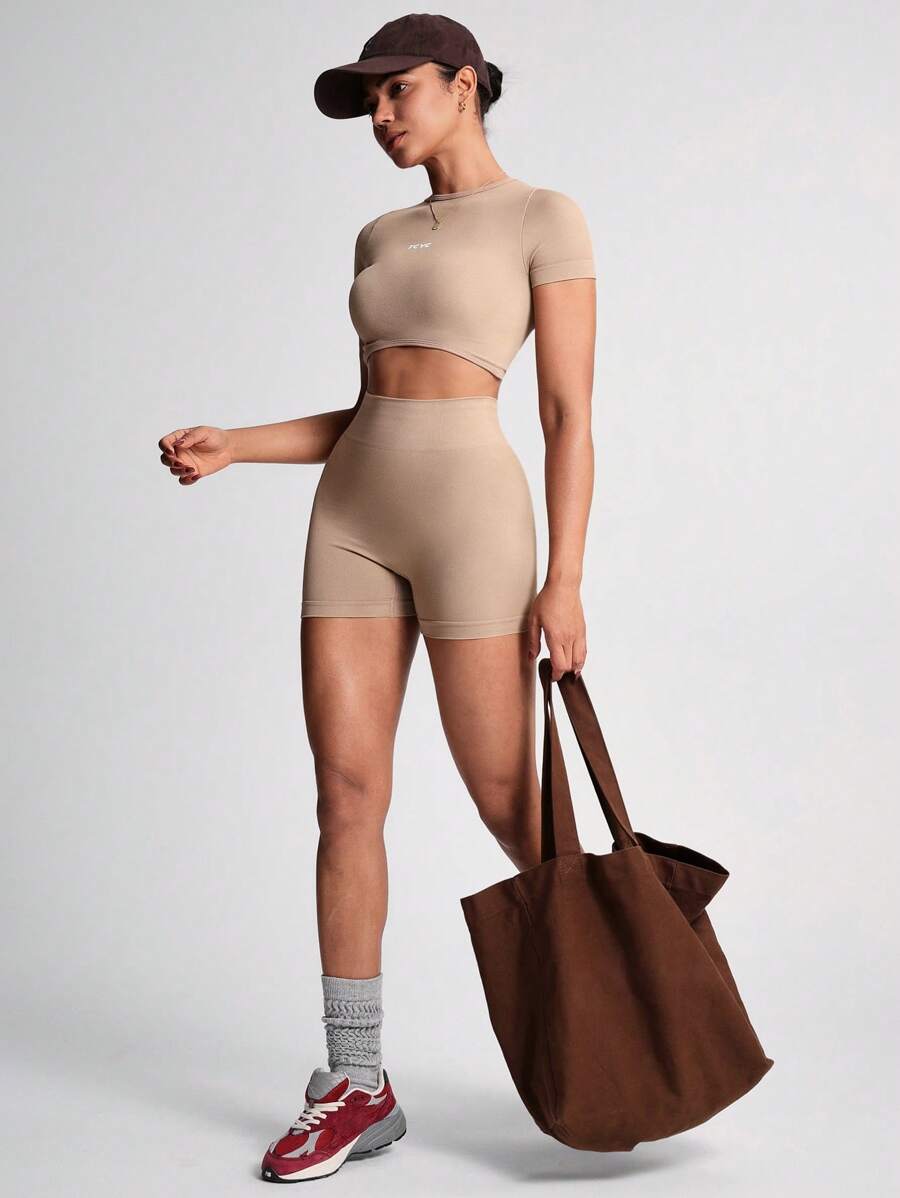 TCVC Conjunto de Camiseta de Manga Curta e Shorts Esportivos de Alta Elasticidade para Mulheres, Gola Redonda Sem Costura, Cintura Alta com Controle da Barriga e Bumbum Empinado, Tecido Amigável à Pele, Modelagem Justa, Versátil e Casual, Adequado para To