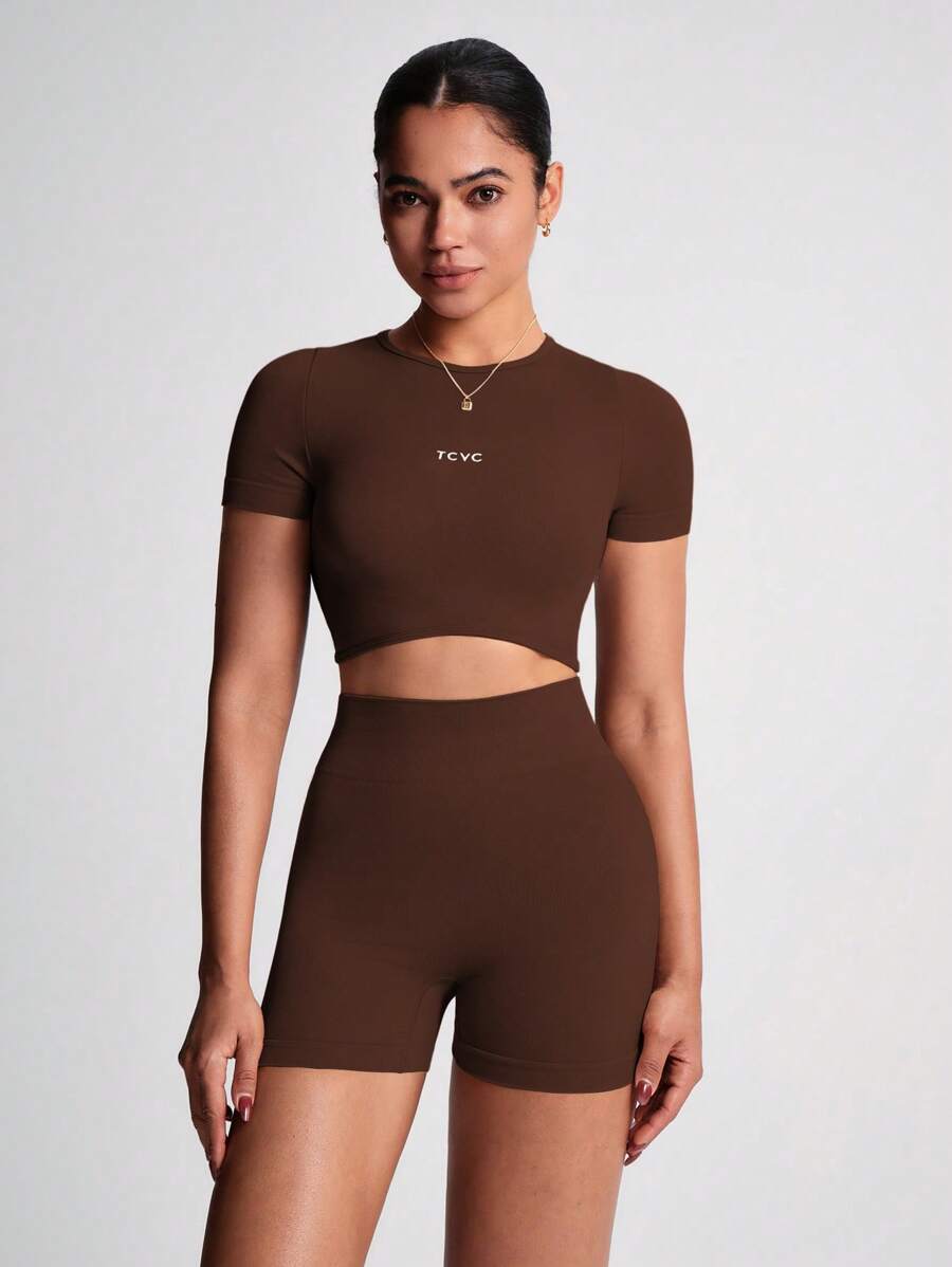 TCVC Conjunto de Camiseta de Manga Curta e Shorts Esportivos de Alta Elasticidade para Mulheres, Gola Redonda Sem Costura, Cintura Alta com Controle da Barriga e Bumbum Empinado, Tecido Amigável à Pele, Modelagem Justa, Versátil e Casual, Adequado para To