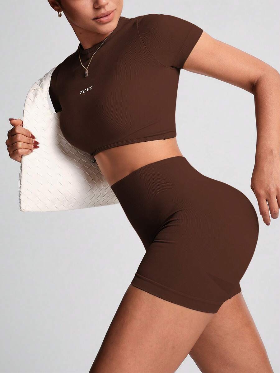 TCVC Conjunto de Camiseta de Manga Curta e Shorts Esportivos de Alta Elasticidade para Mulheres, Gola Redonda Sem Costura, Cintura Alta com Controle da Barriga e Bumbum Empinado, Tecido Amigável à Pele, Modelagem Justa, Versátil e Casual, Adequado para To